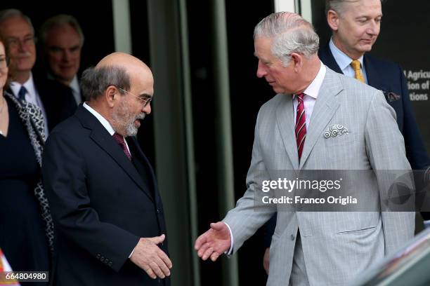 Prince Charles Prince of Wales greets FAO Director General Jose Graziano da Silva at the end of the visit to the Food and Agriculture Organization...