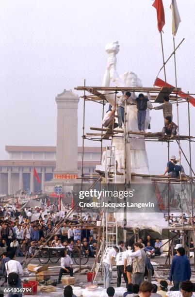 As a final act of protest at the end of their unsuccessful hunger strike, students erect a statue called the Goddess of Democracy in Beijing's...