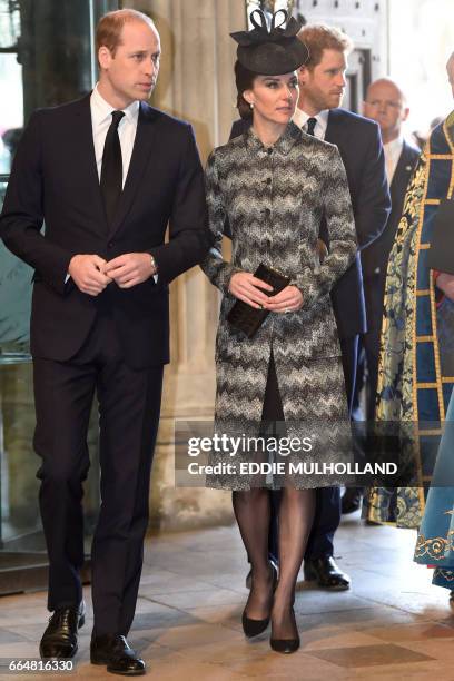 Britain's Prince William, Duke of Cambridge and Britain's Catherine, Duchess of Cambridge attend a Service of Remembrance at Westminster Abbey in...