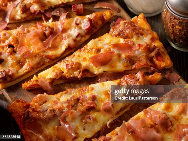 meat lovers, flat bread pizza - pizza with ham stock pictures, royalty-free photos & images