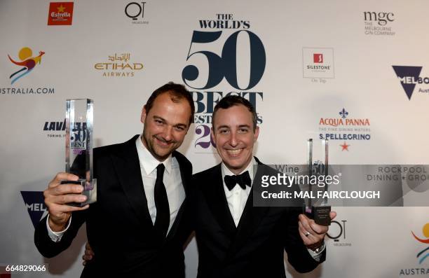 Daniel Humm and Will Guidara pose with their trophies after winning the Worlds Best Restaurant award at the World's 50 Best Restaurants awards in...