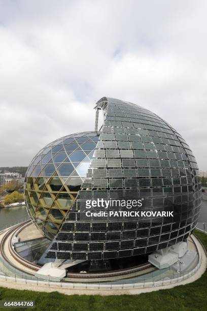 Photovoltaic solar panels are integrated in the sail that can rotate around the auditorium of the new 'La Seine Musicale' cultural and musical...