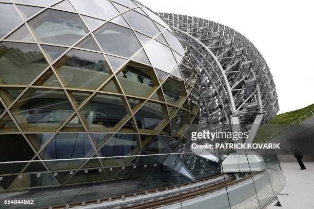 Photovoltaic solar panels are integrated in the sail that can rotate around the auditorium of the new 'La Seine Musicale' cultural and musical...