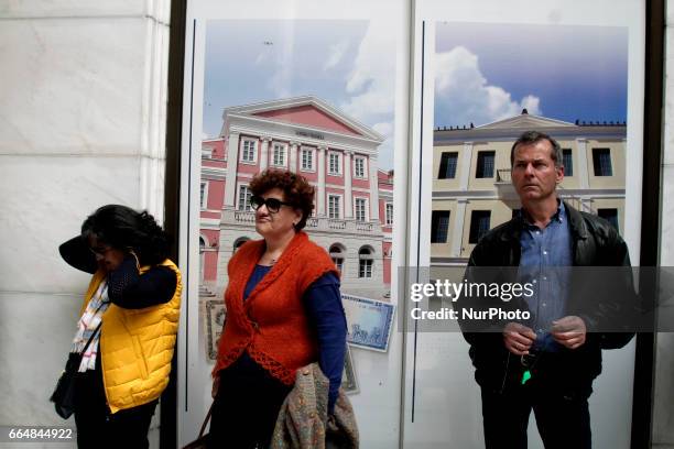 Pensioners of Alpha Bank in a protest rally outside the bank's main branch, in central Athens on April 5, 2017