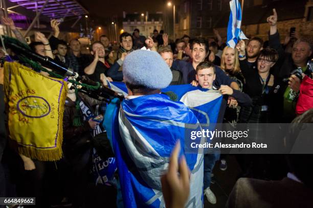 Edinburgh, Scotland . Supporter of YES campaign gathered in front of the Scottish Parliament Building the night before to receive the final results...