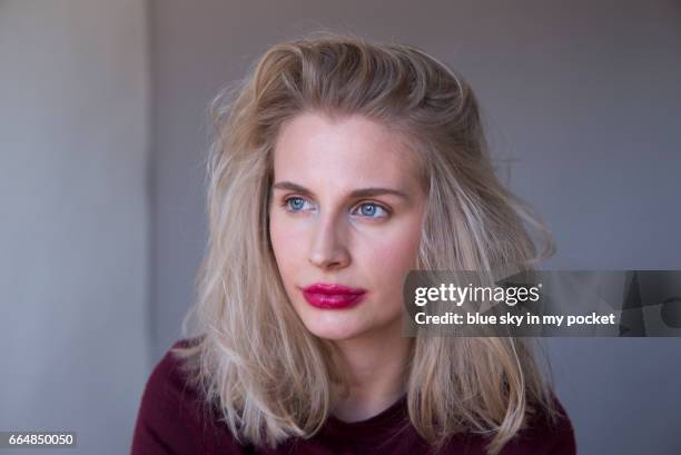 the snogged lip make-up look, with flawless sharp clear skin. - red lipstick smudge stock pictures, royalty-free photos & images