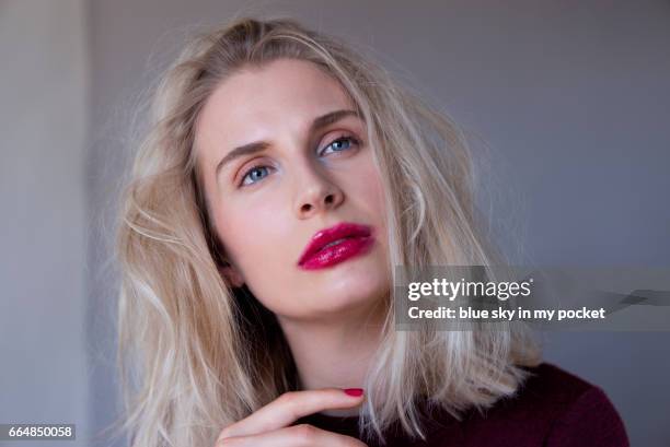 the snogged lip make-up look, with flawless sharp clear skin. - red lipstick smudge stock pictures, royalty-free photos & images