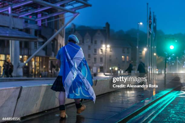 Edinburgh, Scotland . Supporter of YES campaign gathered in front of the Scottish Parliament Building the night before to receive the final results...