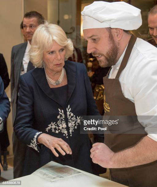 Camilla, Duchess of Cornwall visits Cafe Demel on April 5, 2017 in Vienna, Austria. The Duchess was shown a pastry thinness test which involves using...