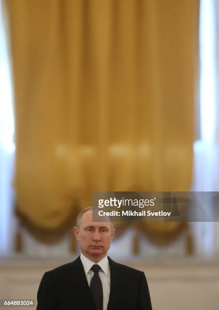 Russian President Vladimir Putin attends the welcoming ceremony at the Grand Kremlin Palace in Moscow, Russia, April 2017. President of Uzbekistan...