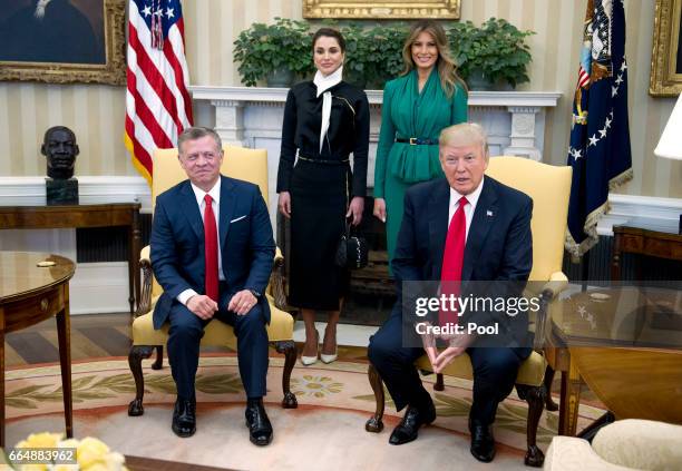 President Donald Trump meets with King Abdullah II of Jordan in the Oval Office of the White House on April 5, 2017 in Washington, DC. Standing...