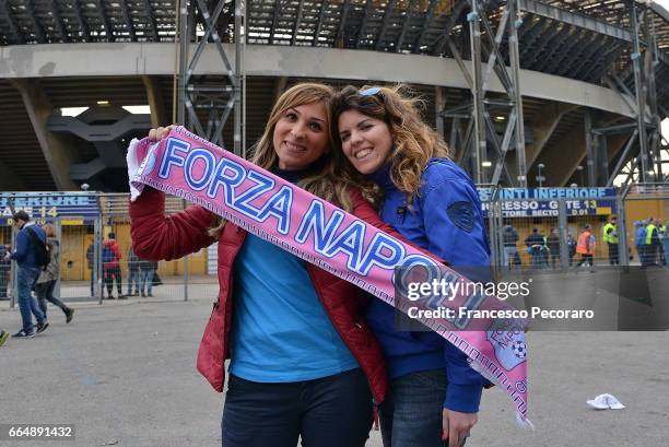 Fans of SSC Napoli show their scarves before the TIM Cup match between SSC Napoli and Juventus FC at Stadio San Paolo on April 5, 2017 in Naples,...