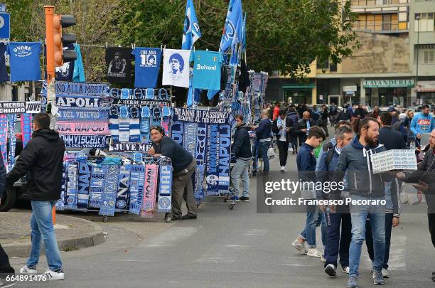 Fans of SSC Napoli walk outside the stadium before the TIM Cup match between SSC Napoli and Juventus FC at Stadio San Paolo on April 5, 2017 in...