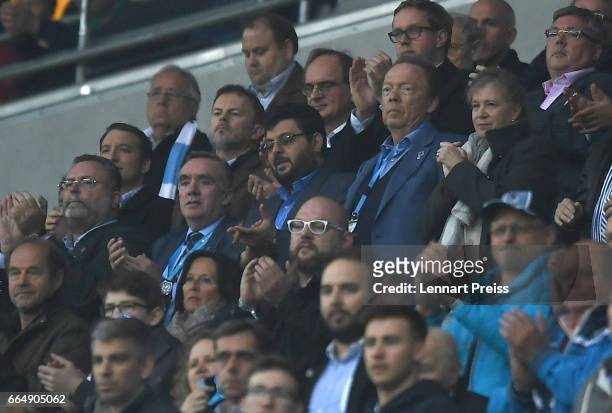 Ian Ayre , managing director of TSV 1860 Muenchen, investor Hasan Ismaik, and Peter Cassalette, president of 1860 Muenchen watch the Second...