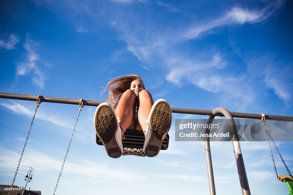Woman On Swing Set