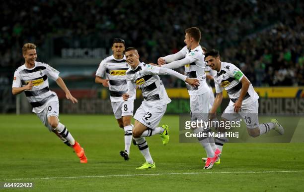 Laszlo Benes of Gladbach celebrates after he scores the opening goal during the Bundesliga match between Borussia Moenchengladbach and Hertha BSC at...