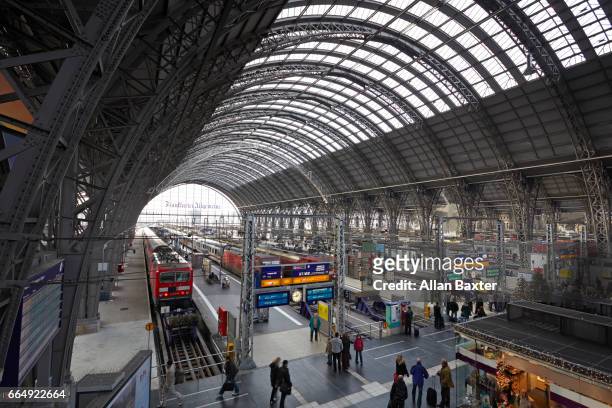 interior of frankfurt (main) train station with commuters - railroad station stock pictures, royalty-free photos & images