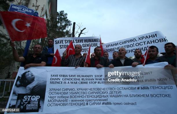 People gather in front of the Russian Embassy of Ankara to condemn Assad regime forces' suspected chemical gas attack in the opposition-held Syrian...