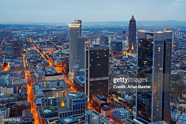 elevated skyline of frankfurt's business district at dusk - frankfurt stock-fotos und bilder