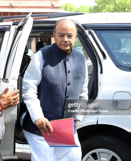 Union Finance Minister Arun Jaitley arrives for attending the Parliament Budget Session on April 5, 2017 in New Delhi, India. Employees suffering...