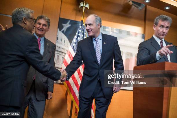 From left, Rep. Bobby Scott, D-Va., Sens., Joe Manchin, D-W.Va., Bob Casey, D-Pa., and Rep. Matt Cartwright, D-Pa., conduct a news conference in the...