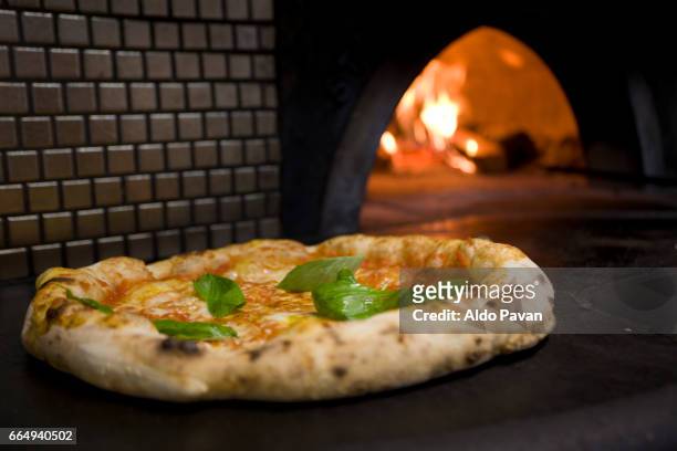 italy, campania, caiazzo, preparation of pizza - pizzeria ストックフォトと画像