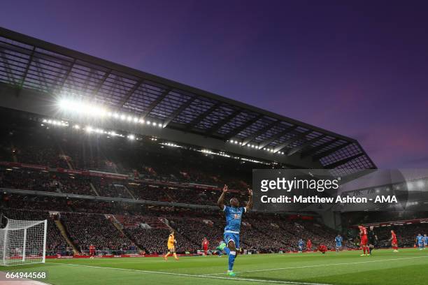 Benik Afobe of Bournemouth celebrates after scoring a goal to make it 0-1 during the Premier League match between Liverpool and AFC Bournemouth at...