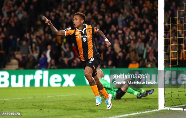 Abel Hernandez of Hull City celebrates scoring his sides third goal during the Premier League match between Hull City and Middlesbrough at the KCOM...