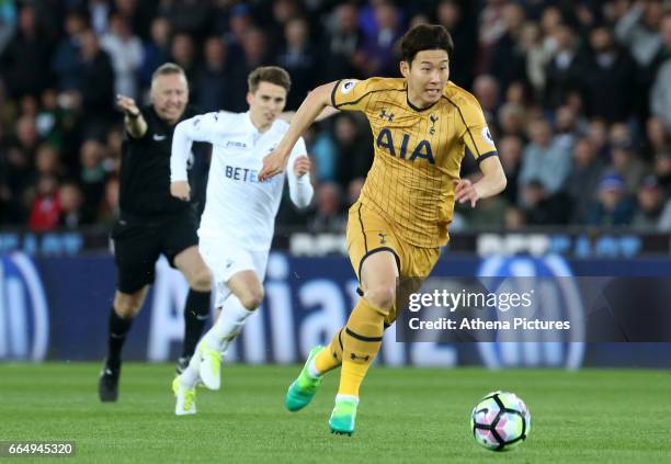 Son Heung-min of Tottenham Hotspur makes a break for goal during the Premier League match between Swansea City and Tottenham Hotspur at The Liberty...