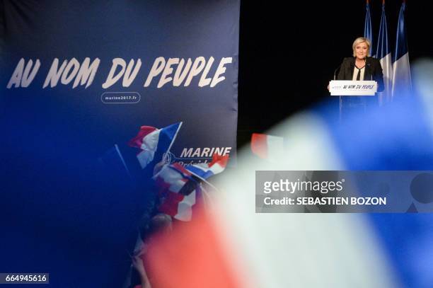 French presidential election candidate for the far-right Front National party Marine Le Pen speaks during a rally in Monswiller, north-eastern...
