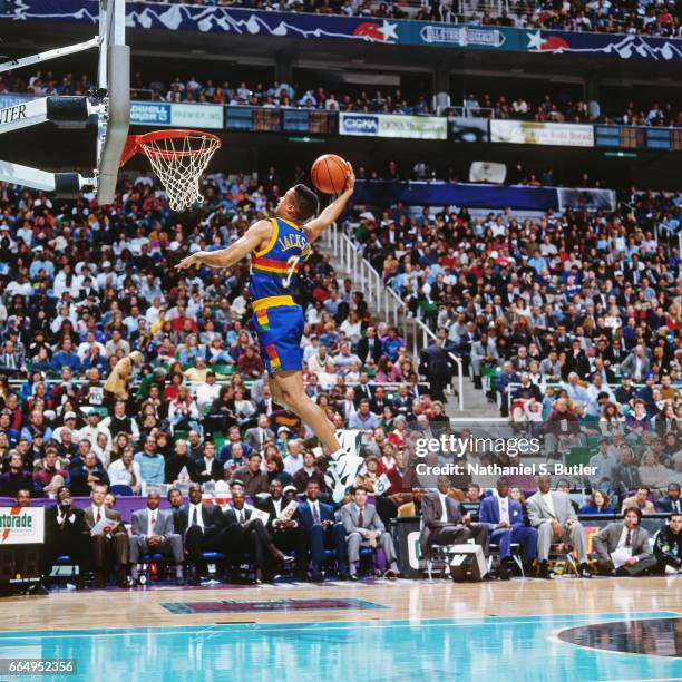 Chris Jackson of the Denver Nuggets attempts a dunk during the 1993 Slam Dunk Contest on February 20, 1993 at the Delta Center in Salt Lake City,...