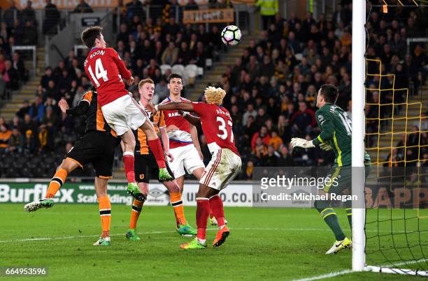 Marten de Roon of Middlesbrough scores his sides second goal during the Premier League match between Hull City and Middlesbrough at the KCOM Stadium...
