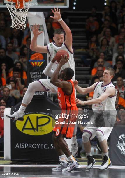 Alen Omic, #92 of Unicaja Malaga competes with Romain Sato, #10 of Valencia Basket during the 2016-2017 7Days Eurocup Finals Leg 3 Valencia Basket v...