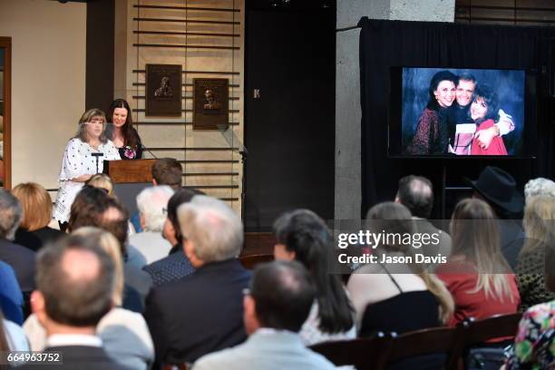 Daughters of Jerry Reed, Seidina Hubbard and Lottie Zavala accept induction into the Country Music Hall of Fame on behalf of their father, the late...