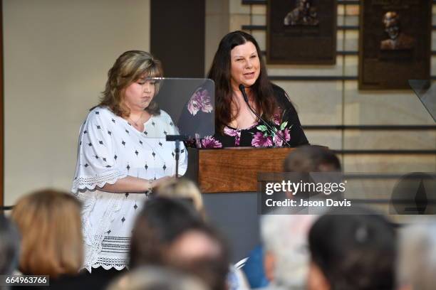 Daughters of Jerry Reed, Seidina Hubbard and Lottie Zavala accept induction into the Country Music Hall of Fame on behalf of their father, the late...