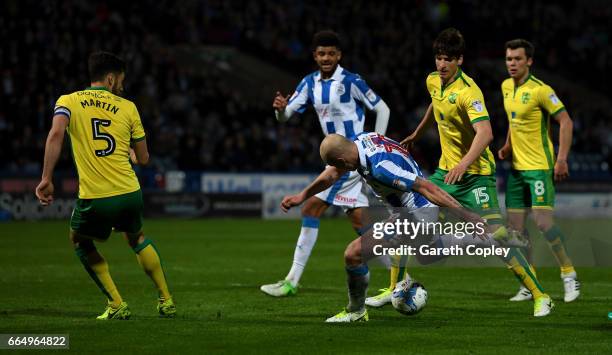 Aaron Mooy of Huddersfield scores his teams second goal during the Sky Bet Championship match between Huddersfield Town and Norwich City at Galpharm...