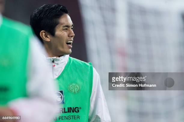 Yoshinori Muto of Mainz looks on as he warms up during the Bundesliga match between 1. FSV Mainz 05 and RB Leipzig at Opel Arena on April 5, 2017 in...