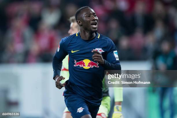 Naby Keita of Leipzig celebrates his team's third goal during the Bundesliga match between 1. FSV Mainz 05 and RB Leipzig at Opel Arena on April 5,...