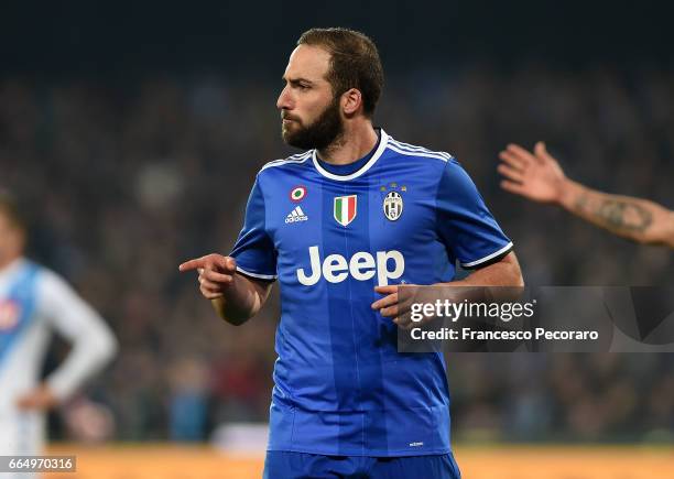 Gonzalo Higuain of Juventus FC celebrates after scoring goal 1-2 during the TIM Cup match between SSC Napoli and Juventus FC at Stadio San Paolo on...