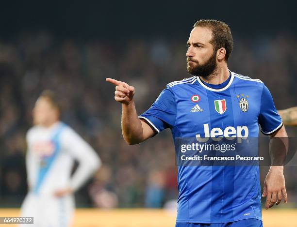 Gonzalo Higuain of Juventus FC celebrates after scoring goal 1-2 during the TIM Cup match between SSC Napoli and Juventus FC at Stadio San Paolo on...