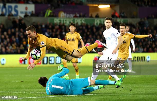 Lukasz Fabianski of Swansea City and Vincent Janssen of Tottenham Hotspur during the Premier League match between Swansea City and Tottenham Hotspur...