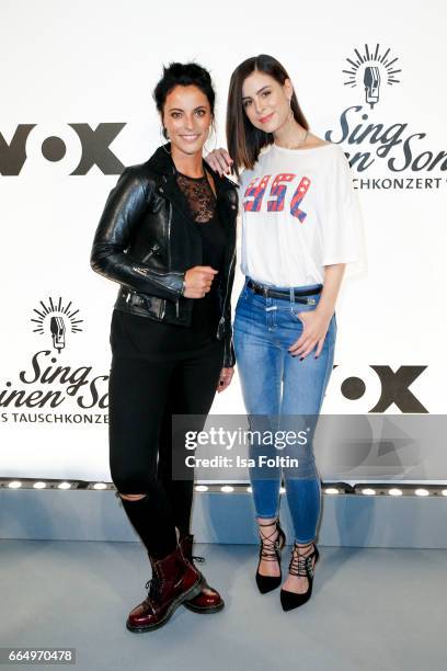 Stefanie Kloss, singer of the band 'Silbermond' and German singer Lena Meyer-Landrut poses during the 'Sing meinen Song' photo call on April 5, 2017...