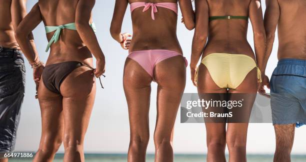 panoramic view of unrecognizable people in swimwear during summer day. - beach bum imagens e fotografias de stock