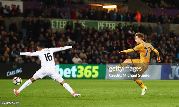 Christian Eriksen of Tottenham Hotspur scores his sides third goal during the Premier League match between Swansea City and Tottenham Hotspur at the...