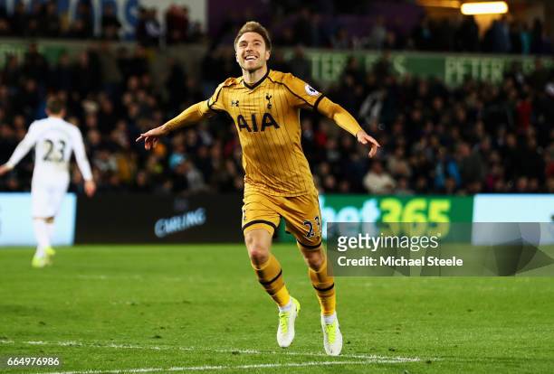 Christian Eriksen of Tottenham Hotspur celebrates scoring his sides third goal during the Premier League match between Swansea City and Tottenham...
