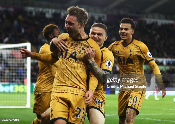 Christian Eriksen of Tottenham Hotspur celebrates scoring his sides third goal during the Premier League match between Swansea City and Tottenham...