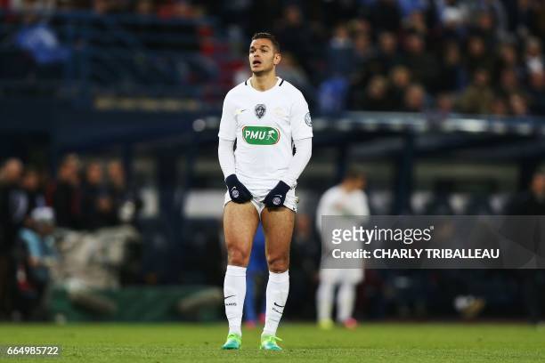 Paris Saint-Germain's French forward Hatem Ben Arfa reacts during the French Cup football match between Avranches and Paris Saint-Germain at Michel...