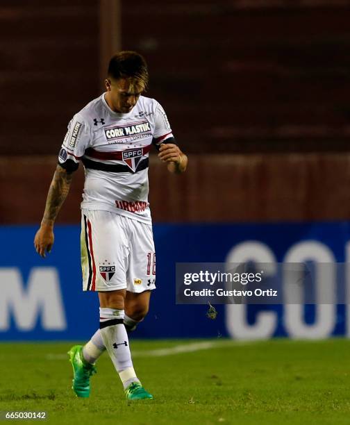 Julio Buffarini of Sao Paulo leaves the field after being expelled during a first leg match between Defensa y Justicia and Sao Paulo as part of of...