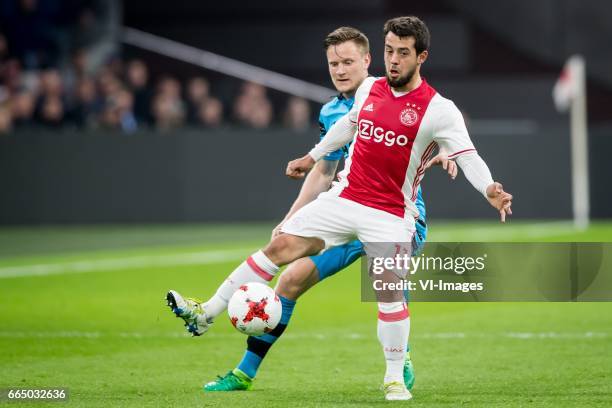 Mattias Johansson of AZ, Amin Younes of Ajax.during the Dutch Eredivisie match between Ajax Amsterdam and AZ Alkmaar at the Amsterdam Arena on April...