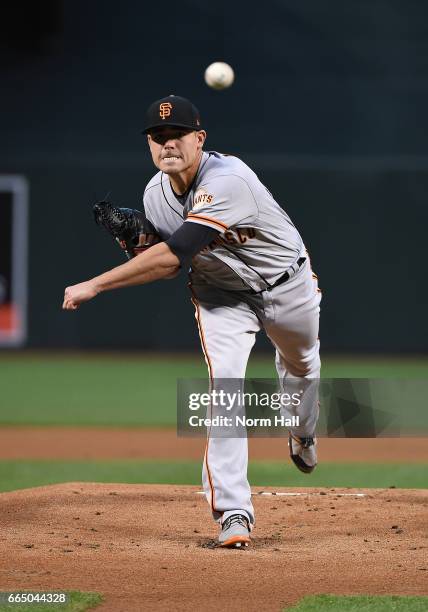 Matt Moore of the San Francisco Giants delivers a warm up pitch during the first inning against the Arizona Diamondbacks at Chase Field on April 5,...